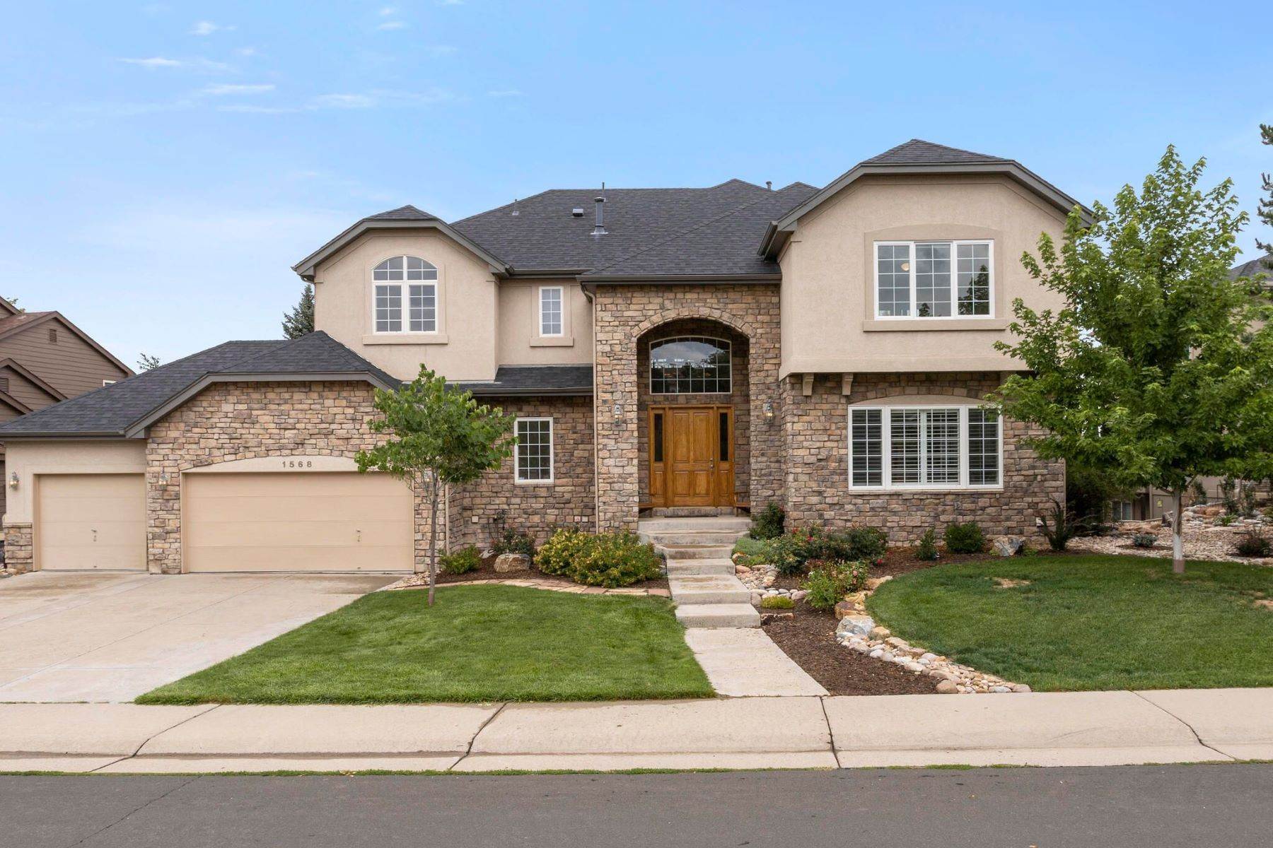 Single Family Homes for Active at A delightful traditional two-story home with a finished walk-out basement! 1568 Meyerwood Circle Highlands Ranch, Colorado 80129 United States