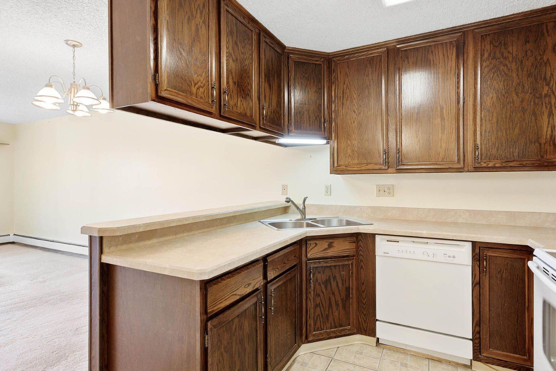 9. Condominiums for Active at Spacious lock-and-go condo near parks, transit, shopping, trails, restaurants. 3460 S Poplar Street, Unit# 106 Denver, Colorado 80224 United States