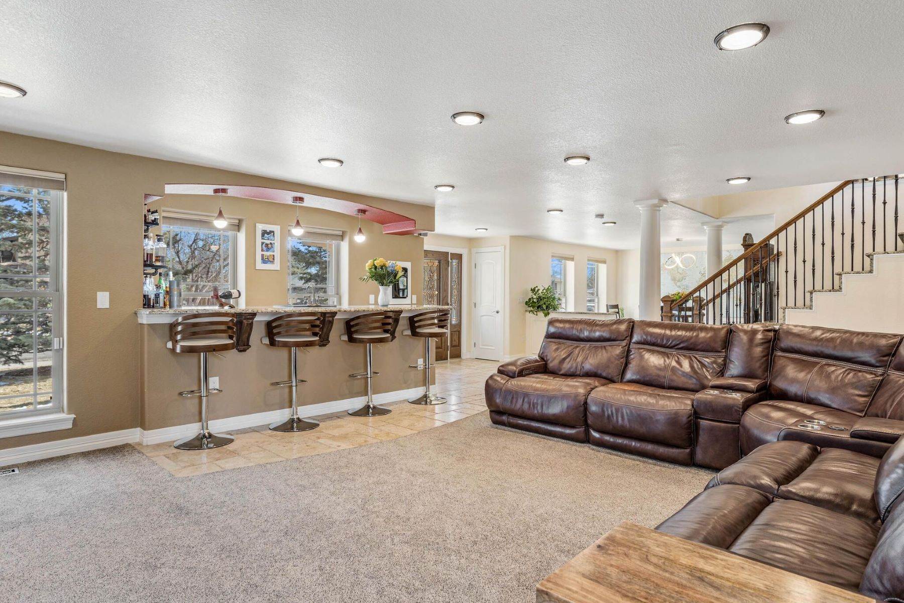 6. Single Family Homes for Active at Large Custom Home with Separate Guest House 7595 Lewis Street Arvada, Colorado 80005 United States